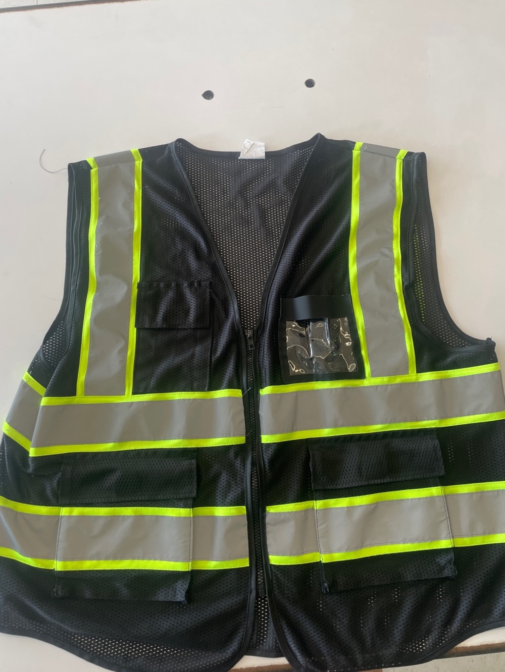 High-Visibility Safety Vest in Black with Neon Yellow Stripes